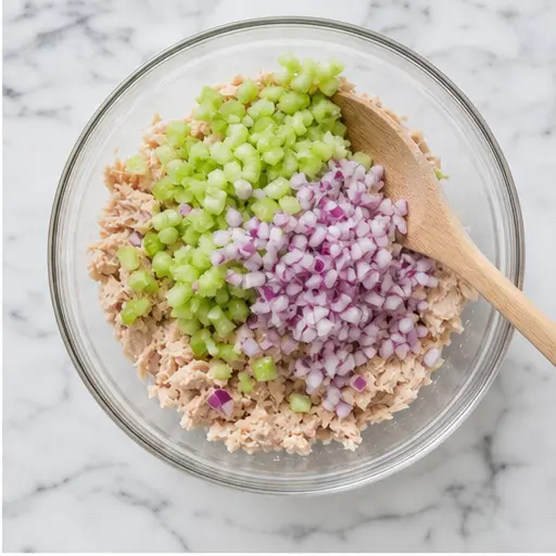 Step 2: Adding chopped celery and red onion