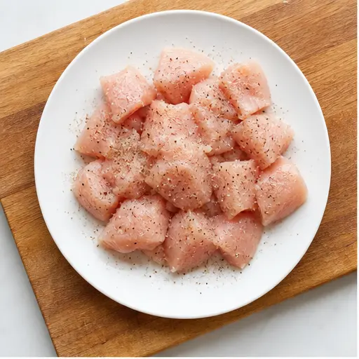 Step 1: Seasoning raw chicken chunks