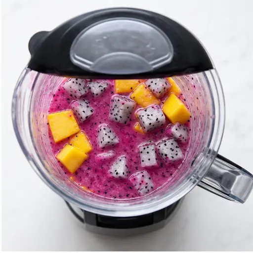 Step 2: Blending mango and dragon fruit with honey