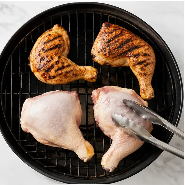 Step 3: Flip chicken quarters and continue grilling