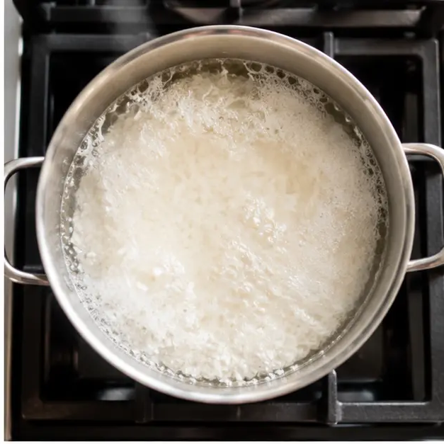 Step 2: Boiling the rice and water