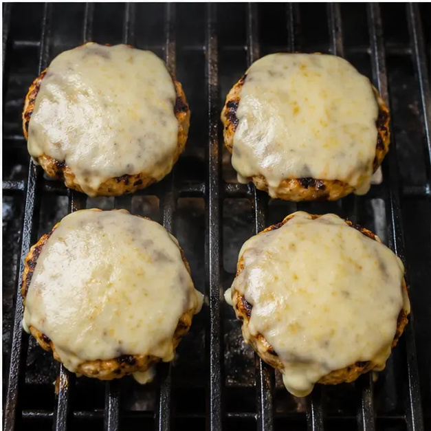 Step 4: Melting cheese on cooked patties