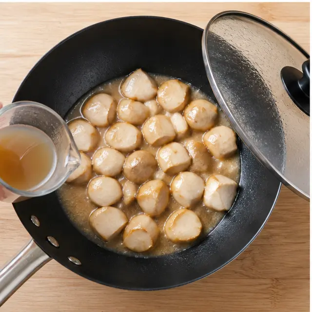 Steaming the mushrooms with broth under a covered wok