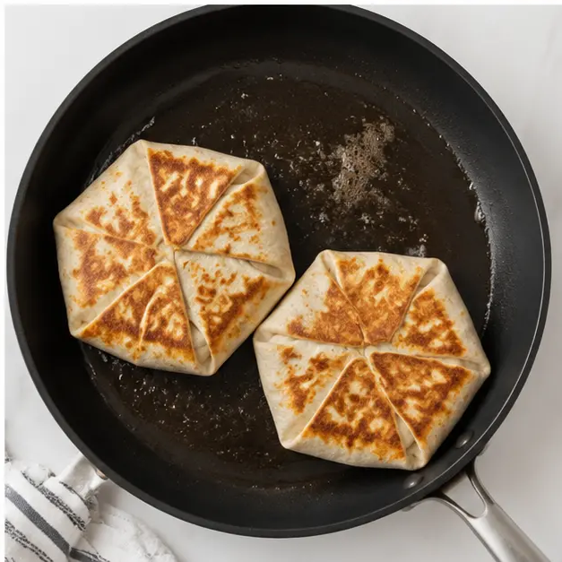 Step 4: Frying the crunch wraps until golden brown