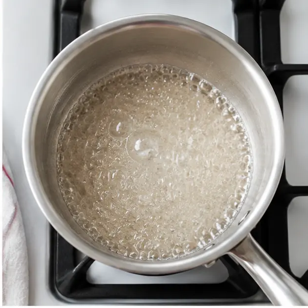 Step 2: Simmering sugar and water into simple syrup