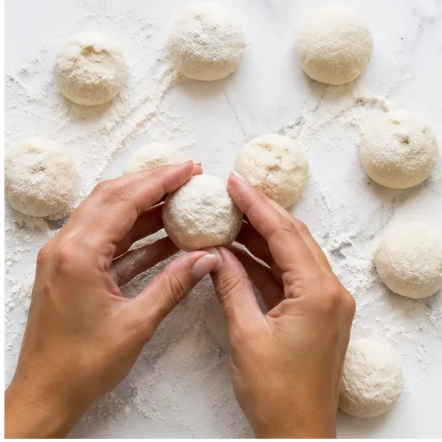 Step 2: Rolling the smooth dough into 20 mini bagel balls